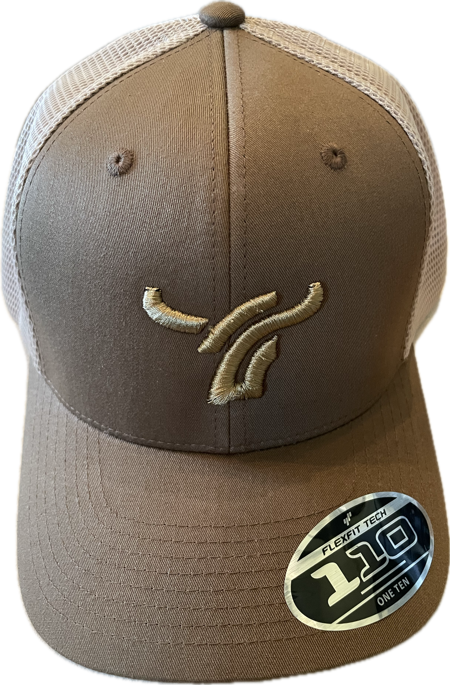 Light brown with tan mesh 110 snapback flex fit. Large logo